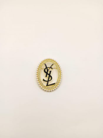 Yves Saint Laurent Złota Broszka z Czarnym Logo